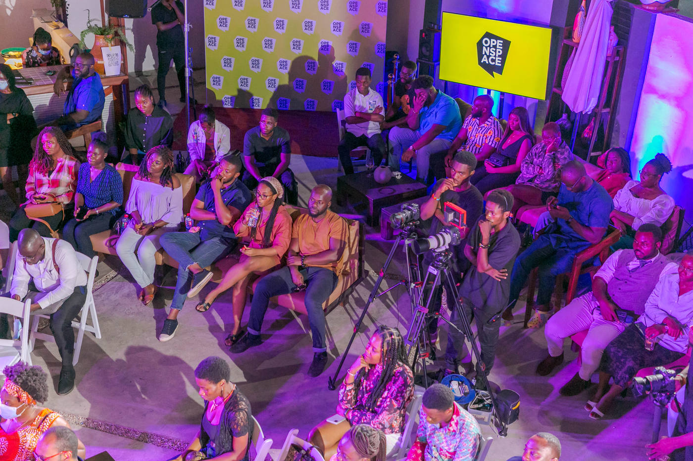 A full OPENSPACE audience in conversation